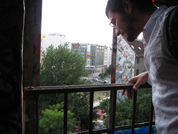 Phil on the fourth floor, looking out on Tacheles courtyard.