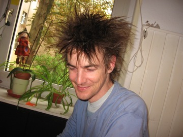 Keith, hair drying post-bike ride in the rain to our recording session....
